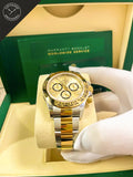 Daytona in Acciaio e oro giallo con Quadrante in Oro 40mm