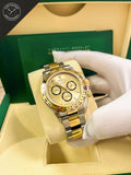 Daytona in Acciaio e oro giallo con Quadrante in Oro 40mm